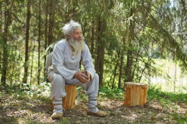 Russian man in bast shoes